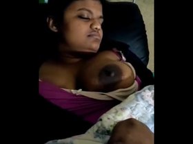 After a passionate lovemaking session, I tease and play with my wife's large breasts