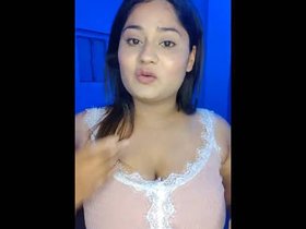 Indian girl with large breasts dances sensually on Tango