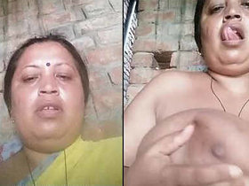 Indian aunt reveals her large breasts