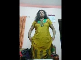 Indian aunt changes clothes in bedroom