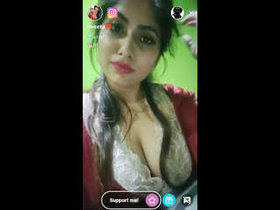 Sweety, a Bengali housewife, reveals her breasts in a seductive tango