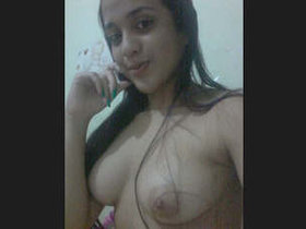 Indian girl plays with her breasts