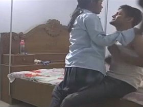 A teenage girl goes on a date with her boyfriend while wearing her college attire