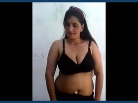 Busty milf with a seductive tank top