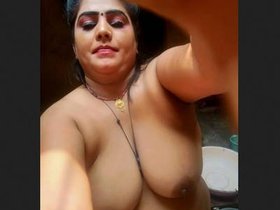 A desi woman's solo bathing session