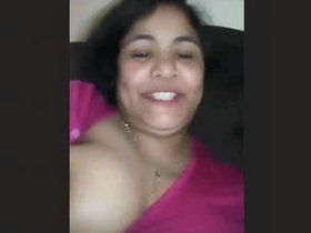 Aroused South Asian auntie invites you to watch her breasts