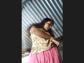 Village woman reveals her voluptuous figure in an erotic video
