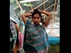 A nude Bengali woman engages in explicit acts