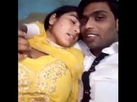 Indian couples passionately kissing and squeezing breasts
