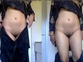 Indian girl in traditional salwar kameez outfit strips down and reveals her charms