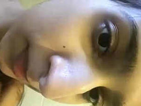 Indian girl squeezes her own breasts
