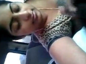 Indian wife gives oral pleasure in a vehicle