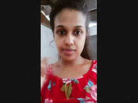 A seductive Sri Lankan woman displays her breasts