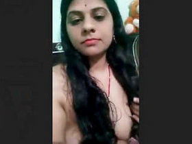 Indian wife Deepika reveals herself in a solo strip video