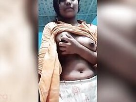 Naughty girl Desi shows her big round tits on camera
