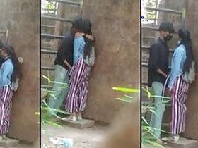 Open Desi mms clip of Indian lovers caught kissing at wall