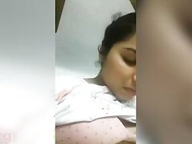 Desi porn XXX model who pinches her nipples before exposing her bush