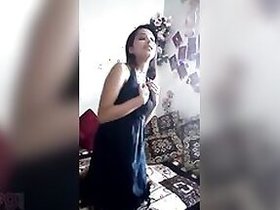 Nepalese escort girl undresses for her client