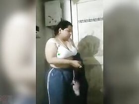 Desi shows off her hot tits in the bathroom looking totally sexy