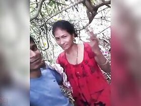 Desi Bhabhi in red sari takes Devar XXX's boner in her hands and jerks off