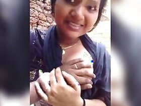 Mallu engulfs breasts in outdoor sex MMC