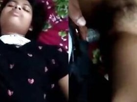 Desi Indian woman is asleep, but horny husband comes in and stuffs her xxx hole with black mamba cock