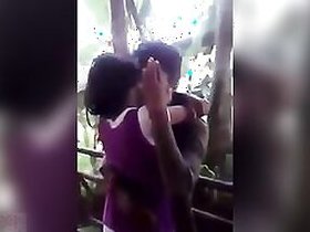 College couples enjoy romantic kiss at lover's point