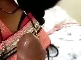 Desi Bhabhi sucks her lover's cock