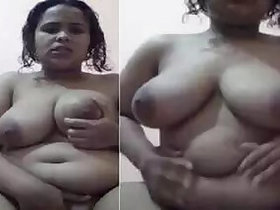 Desi aunt with a big ass jerks her tight pussy in the nude