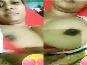 Desi Indian shows off her big tits and pussy