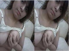 Paki girl shows her tits and jerks off with her fingers