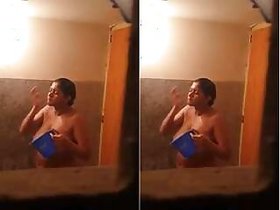 Horny Desi Bhabhi bathing, Captured by Hidden Camera